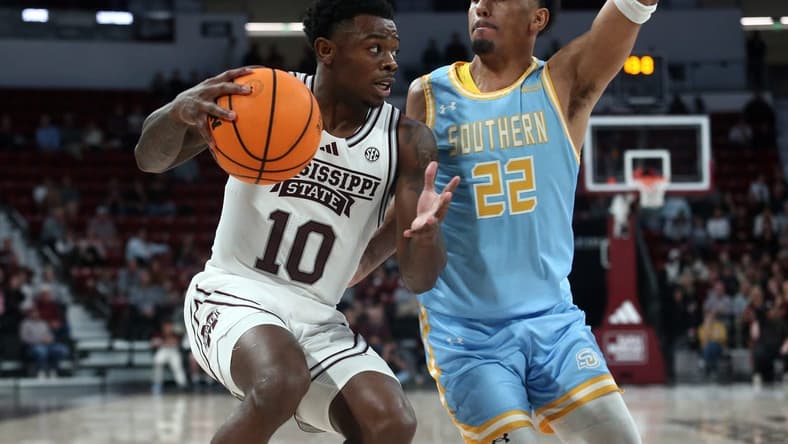 Dec 3, 2023; Starkville, Mississippi, USA; Mississippi State Bulldogs guard Dashawn Davis (10) drives to the basket as Southern Jaguars guard Antoine Jacks (2) defends during the second half at Humphrey Coliseum. Mandatory Credit: Petre Thomas-USA TODAY Sports
