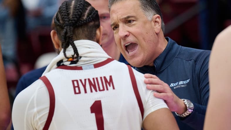 Dec 3, 2023; Stanford, California, USA; San Diego Toreros head coach Steve Lavin congratulates Stanford Cardinal guard Jared Bynum (1) after the game between the Stanford Cardinal and the San Diego Toreros at Maples Pavilion. Mandatory Credit: Robert Edwards-USA TODAY Sports
