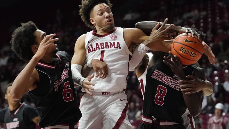 Dec 4, 2023; Tuscaloosa, Alabama, USA;  Arkansas State guard Taryn Todd (6), Alabama guard Mark Sears (1) and Arkansas State forward Lado Laku (8) fight to control a rebound at Coleman Coliseum. Mandatory Credit: Gary Cosby Jr.-USA TODAY Sports