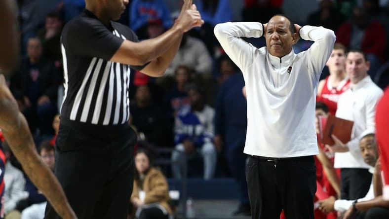 Nov 28, 2023; Oxford, Mississippi, USA; North Carolina State Wolfpack head coach Kevin Keatts (right) reacts to a foul call during the second half against the Mississippi Rebels at The Sandy and John Black Pavilion at Ole Miss. Mandatory Credit: Petre Thomas-USA TODAY Sports