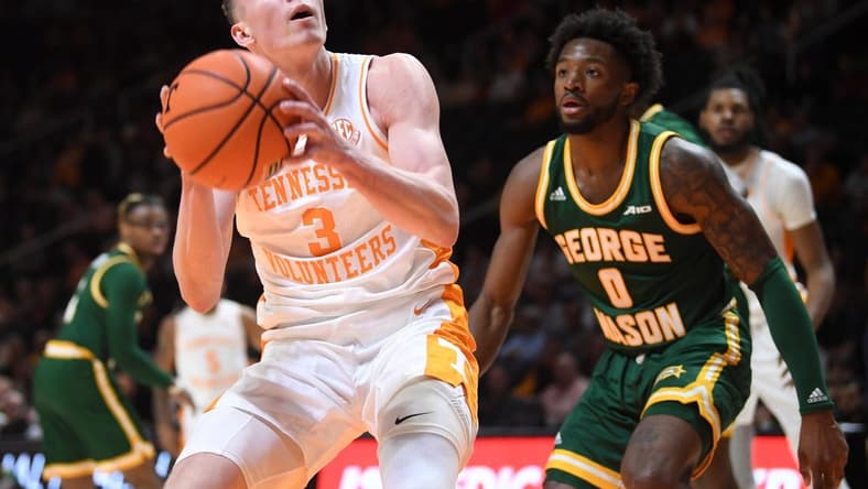 Tennessee guard Dalton Knecht (3) takes a shot during an NCAA college basketball game between Tennessee and George Mason at Thompson-Boling Arena at Food City Center, Tuesday, Dec. 5, 2023.