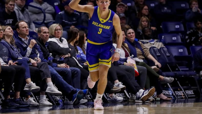 Dec 5, 2023; Cincinnati, Ohio, USA; Delaware Blue Hens guard Cavan Reilly (3) reacts after a play against the Xavier Musketeers in the first half at Cintas Center. Mandatory Credit: Katie Stratman-USA TODAY Sports