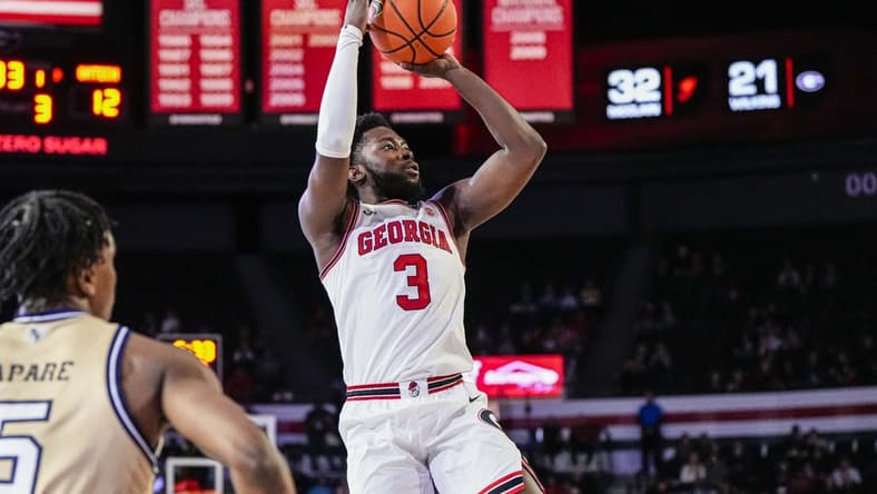Dec 5, 2023; Athens, Georgia, USA; Georgia Bulldogs guard Noah Thomasson (3) shoots against the Georgia Tech Yellow Jackets during the first half at Stegeman Coliseum. Mandatory Credit: Dale Zanine-USA TODAY Sports