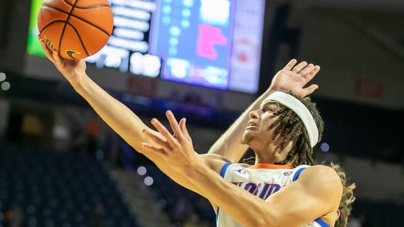 Florida Gators guard Walter Clayton Jr. (1) shoots during first half action of an NCAA basketball game as Florida Gators take on Merrimack College Warrors at Exactech Areana in Gainesville, FL on Tuesday, December 5, 2023. [Alan Youngblood/Gainesville Sun]