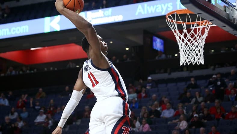Dec 5, 2023; Oxford, Mississippi, USA; Mississippi Rebels guard Matthew Murrell (11) dunks during the second half against the Mount St. Mary's Mountaineers at The Sandy and John Black Pavilion at Ole Miss. Mandatory Credit: Petre Thomas-USA TODAY Sports