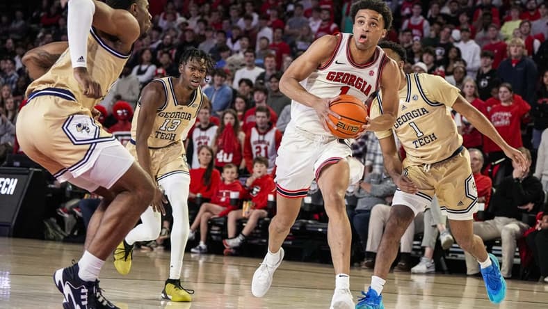 Dec 5, 2023; Athens, Georgia, USA; Georgia Bulldogs guard Jabri Abdur-Rahim (1) drives the ball to the basket against the Georgia Tech Yellow Jackets at Stegeman Coliseum. Mandatory Credit: Dale Zanine-USA TODAY Sports