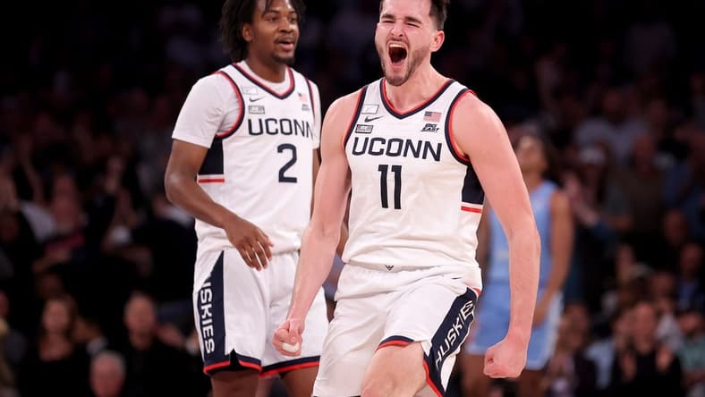 Dec 5, 2023; New York, New York, USA; Connecticut Huskies forward Alex Karaban (11) reacts during the second half against the North Carolina Tar Heels at Madison Square Garden. Mandatory Credit: Brad Penner-USA TODAY Sports