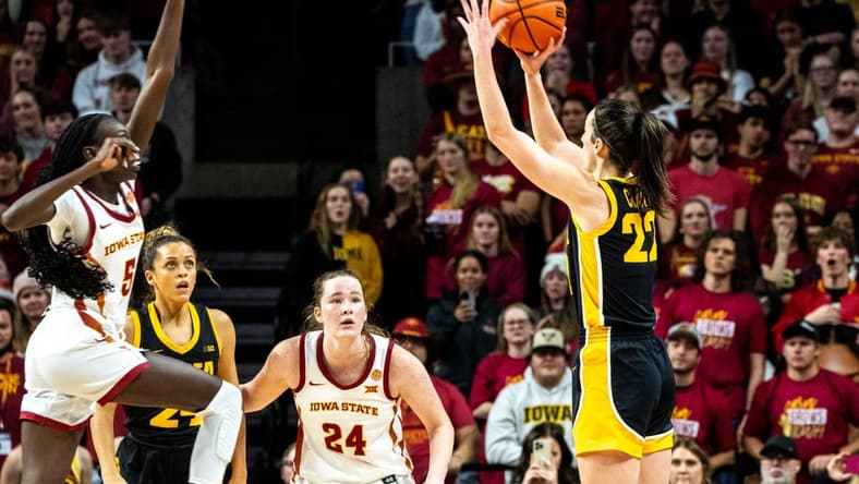 Iowa guard Caitlin Clark (22) scores her 3000th point during a basketball game at Hilton Coliseum on Wednesday, Dec. 6, 2023, in Ames.