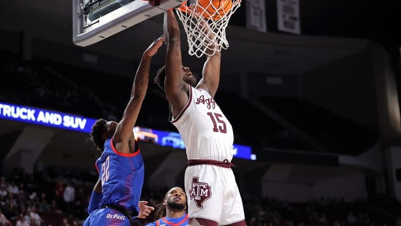 Dec 6, 2023; College Station, Texas, USA; Texas A&M Aggies forward Henry Coleman III (15) dunks against the DePaul Blue Demons during the first half at Reed Arena. Mandatory Credit: Erik Williams-USA TODAY Sports