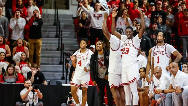 Dec 6, 2023; Raleigh, North Carolina, USA; North Carolina State Wolfpack bench reacts during the second half against Maryland-Eastern Shore Hawks at James T. Valvano Arena at William Neal Reynolds. Mandatory Credit: Jaylynn Nash-USA TODAY Sports