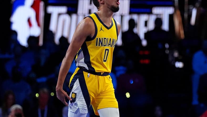 Dec 7, 2023; Las Vegas, Nevada, USA; Indiana Pacers guard Tyrese Haliburton (0) celebrates after beating the Milwaukee Bucks in the NBA In Season Tournament Semifinal at T-Mobile Arena. Mandatory Credit: Kyle Terada-USA TODAY Sports