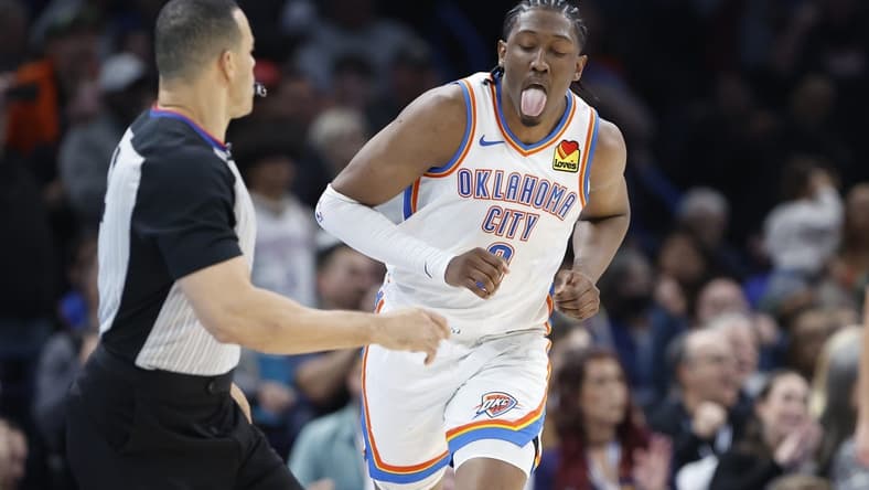 Dec 8, 2023; Oklahoma City, Oklahoma, USA; Oklahoma City Thunder forward Jalen Williams (8) reacts after scoring a basket against the Golden State Warriors during the second half at Paycom Center. Mandatory Credit: Alonzo Adams-USA TODAY Sports
