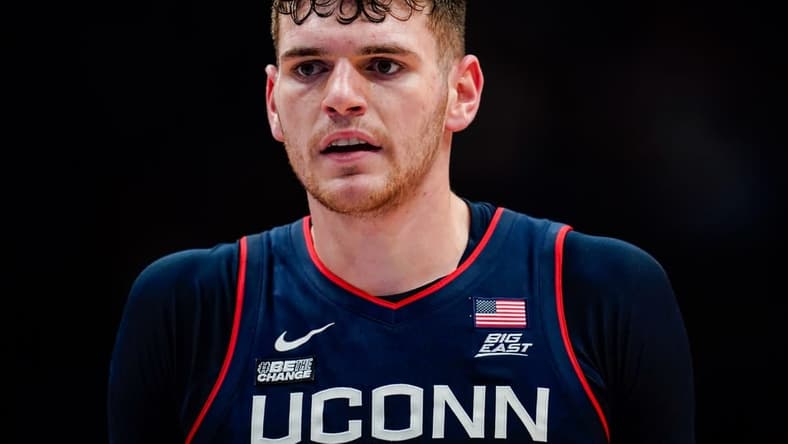 Dec 1, 2023; Lawrence, Kansas, USA; Connecticut Huskies center Donovan Clingan (32) during the first half against the Kansas Jayhawks at Allen Fieldhouse. Mandatory Credit: Jay Biggerstaff-USA TODAY Sports