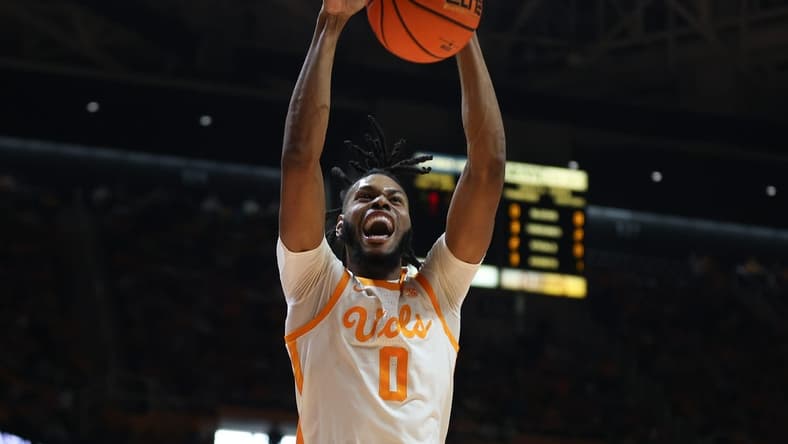 Dec 9, 2023; Knoxville, Tennessee, USA; Tennessee Volunteers forward Jonas Aidoo (0) dunks the ball against the Illinois Fighting Illini during the first half at Food City Center at Thompson-Boling Arena. Mandatory Credit: Randy Sartin-USA TODAY Sports
