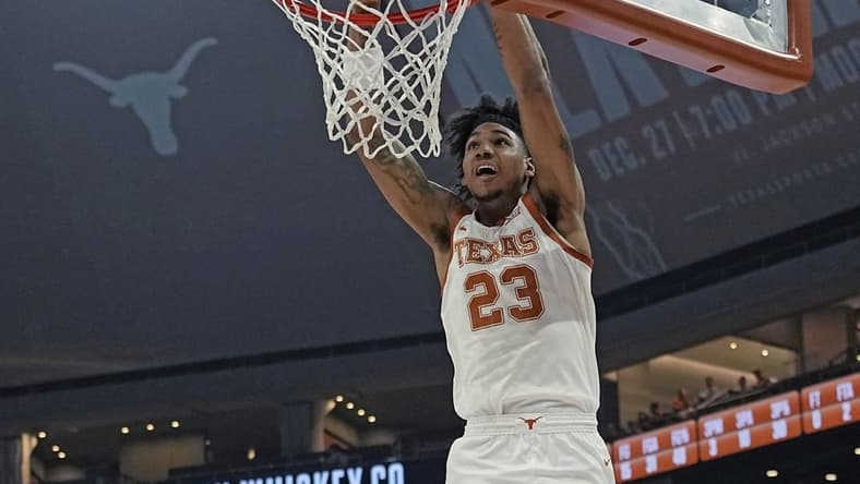 Dec 9, 2023; Austin, Texas, USA; Texas Longhorns forward Dillon Mitchell (23) dunks during the first half against the Houston Christian Huskies at Moody Center. Mandatory Credit: Scott Wachter-USA TODAY Sports