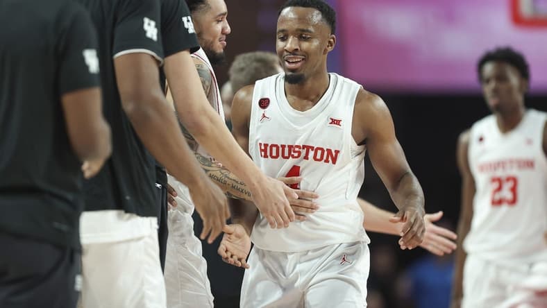 Dec 9, 2023; Houston, Texas, USA; Houston Cougars guard LJ Cryer (4) after a play during the first half against the Jackson State Tigers at Fertitta Center. Mandatory Credit: Troy Taormina-USA TODAY Sports