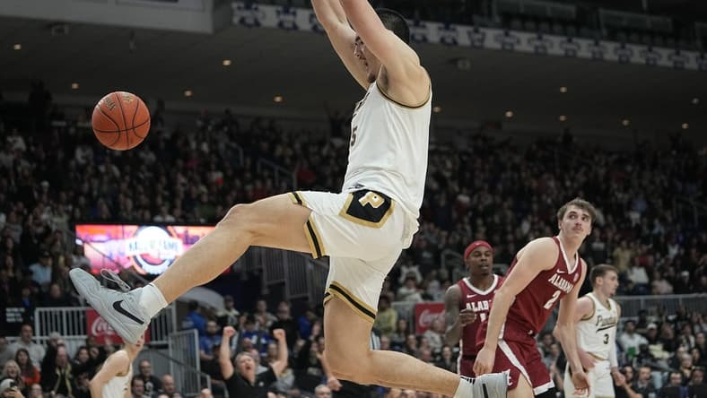 Purdue Boilermakers center Zach Edey (15) dunks against the Alabama Crimson Tide during the second half at Coca-Cola Coliseum. Mandatory Credit: John E. Sokolowski-USA TODAY Sports