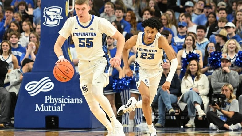 Dec 9, 2023; Omaha, Nebraska, USA; Creighton Bluejays guard Baylor Scheierman (55) dribbles up the court with guard Trey Alexander (23) in the second half against the Central Michigan Chippewas at CHI Health Center Omaha. Mandatory Credit: Steven Branscombe-USA TODAY Sports