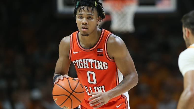 Dec 9, 2023; Knoxville, Tennessee, USA; Illinois Fighting Illini guard Terrence Shannon Jr. (0) brings the ball up court against the Tennessee Volunteers during the second half at Food City Center at Thompson Boling Arena. Mandatory Credit: Randy Sartin-USA TODAY Sports