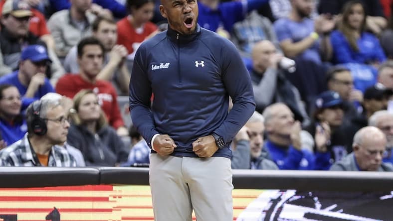 Dec 9, 2023; Newark, New Jersey, USA; Seton Hall Pirates head coach Shaheen Holloway reacts after the Rutgers Scarlet Knights call a timeout in the first half at Prudential Center. Mandatory Credit: Wendell Cruz-USA TODAY Sports
