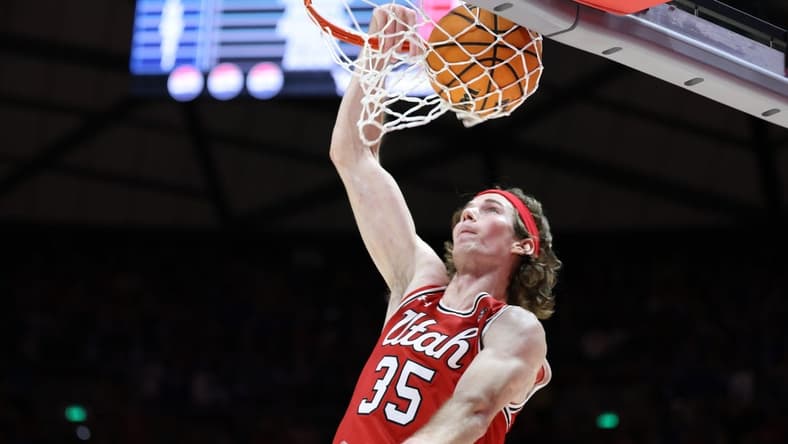 Dec 9, 2023; Salt Lake City, Utah, USA; Utah Utes center Branden Carlson (35) dunks the ball against the Brigham Young Cougars during the second half at Jon M. Huntsman Center. Mandatory Credit: Rob Gray-USA TODAY Sports