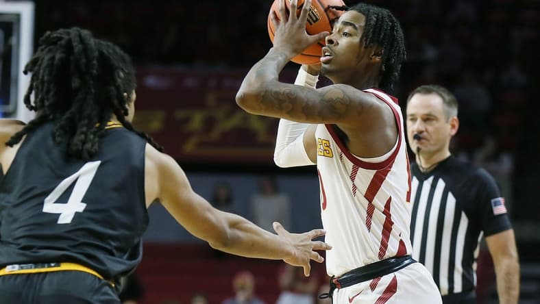 Iowa State Cyclones guard Keshon Gilbert (10) looks for pass the ball around Prairie View A&M Panthers guard Charles Smith IV (4) during the first half of a NCAA college basketball at Hilton Coliseum on Sunday, Dec. 10, 2023, in Ames, Iowa.
