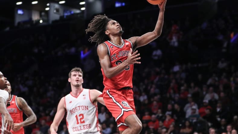 Dec 10, 2023; Brooklyn, New York, USA; St. John's Red Storm forward Glenn Taylor Jr. (35) drives in for a layup in the first half against the Boston College Eagles at Barclays Center. Mandatory Credit: Wendell Cruz-USA TODAY Sports