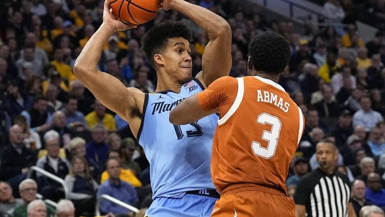 Dec 6, 2023; Milwaukee, Wisconsin, USA; Marquette Golden Eagles forward Oso Ighodaro (13) during the game against the Texas Longhorns at Fiserv Forum. Mandatory Credit: Jeff Hanisch-USA TODAY Sports