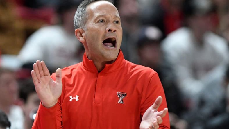 Texas Tech's head coach Grant McCasland claps his hands on the sidelines during the non-conference basketball game against Oral Roberts, Tuesday, Dec. 12, 2023, at United Supermarkets Arena.