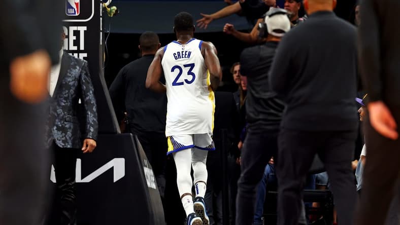 Dec 12, 2023; Phoenix, Arizona, USA; Golden State Warriors forward Draymond Green (23) runs to the locker room after being ejected for a flagrant foul two during the third quarter against the Phoenix Suns at Footprint Center. Mandatory Credit: Mark J. Rebilas-USA TODAY Sports