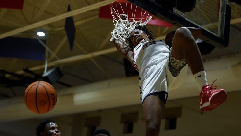 Grovetown shooting guard Derrion Reid (35) dunks the ball during the Grovetown and Brunswick Region 2 AAAAAA championship game at Grovetown High School on Saturday, Feb. 18, 2023. Grovetown defeated Brunswick 89-55.