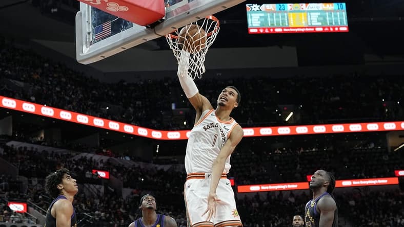 Dec 15, 2023; San Antonio, Texas, USA; San Antonio Spurs forward Victor Wembanyama (1) dunks during the first half against the Los Angeles Lakers at Frost Bank Center. Mandatory Credit: Scott Wachter-USA TODAY Sports