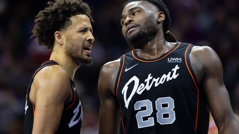 Dec 15, 2023; Philadelphia, Pennsylvania, USA; Detroit Pistons center Isaiah Stewart (28) reacts with guard Cade Cunningham (2) after a Philadelphia 76ers score during the second quarter at Wells Fargo Center. Mandatory Credit: Bill Streicher-USA TODAY Sports