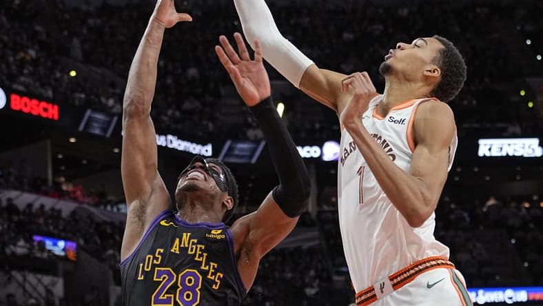 Dec 15, 2023; San Antonio, Texas, USA; San Antonio Spurs forward Victor Wembanyama (1) blocks the shot attempt by Los Angeles Lakers forward Rui Hachimura (28) during the second half at Frost Bank Center. Mandatory Credit: Scott Wachter-USA TODAY Sports