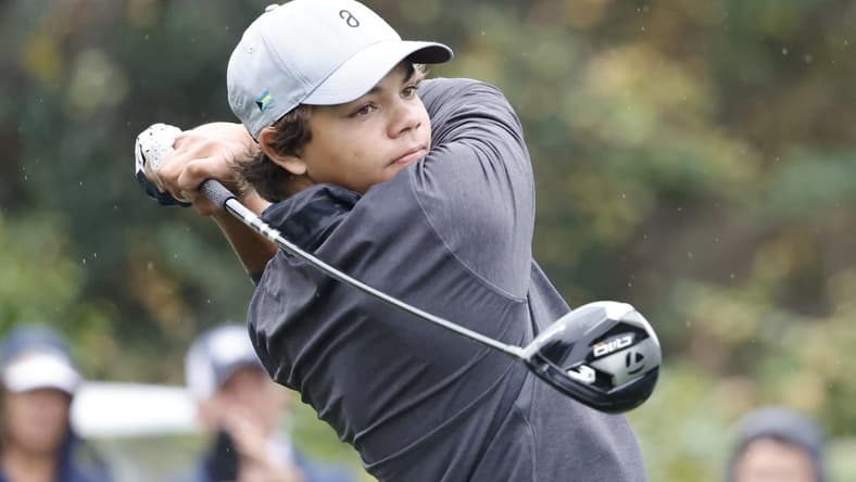Dec 16, 2023; Orlando, Florida, USA; Charlie Woods plays his shot from the sixth tee during the PNC Championship at The Ritz-Carlton Golf Club. Mandatory Credit: Reinhold Matay-USA TODAY Sports