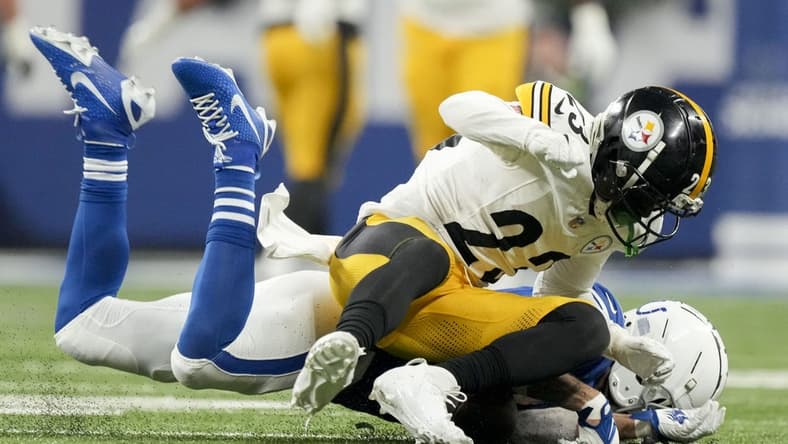 Dec 16, 2023; Indianapolis, Indiana, USA; Indianapolis Colts wide receiver Michael Pittman Jr. (11) collides with Pittsburgh Steelers safety Damontae Kazee (23) during a game against the Pittsburgh Steelers at Lucas Oil Stadium. Mandatory Credit: Robert Scheer-USA TODAY Sports
