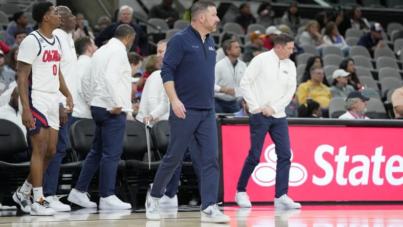 Dec 16, 2023; San Antonio, Texas, USA; Mississippi Rebels head coach Chris Beard looks on during the first half against the California Golden Bears at the Frost Bank Center. Mandatory Credit: Daniel Dunn-USA TODAY Sports