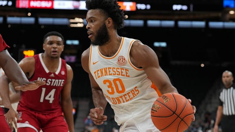Dec 16, 2023; San Antonio, Texas, USA; Tennessee Volunteers guard Josiah-Jordan James (30) dribbles in the second half against the North Carolina State Wolfpack at the Frost Bank Center. Mandatory Credit: Daniel Dunn-USA TODAY Sports
