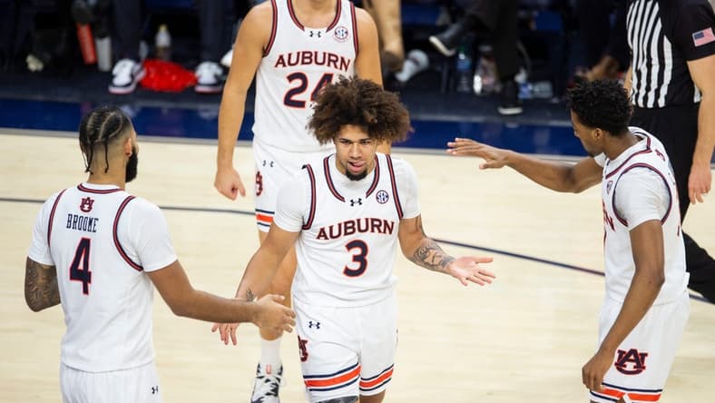 Auburn Tigers guard Tre Donaldson (3) reacts after drawing a foul as Auburn Tigers take on USC Trojans at Neville Arena in Auburn, Ala., on Sunday, Dec. 17, 2023. Auburn Tigers defeated USC Trojans 91-75.