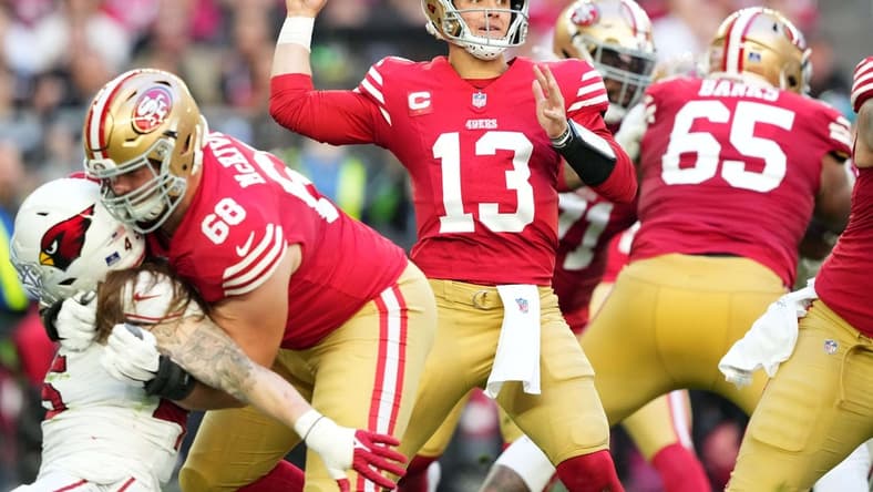 Dec 17, 2023; Glendale, Arizona, USA; San Francisco 49ers quarterback Brock Purdy (13) throws against the Arizona Cardinals during the first half at State Farm Stadium. Mandatory Credit: Joe Camporeale-USA TODAY Sports