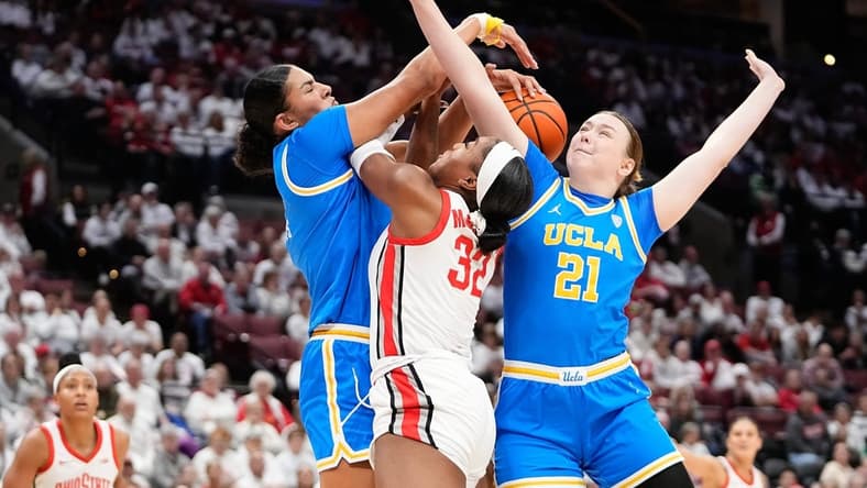 Dec 18, 2023; Columbus, OH, USA; UCLA Bruins center Lauren Betts (51) and forward Lina Sontag (21) block the shot of Ohio State Buckeyes forward Cotie McMahon (32) during the first half of the NCAA women   s basketball game at Value City Arena.