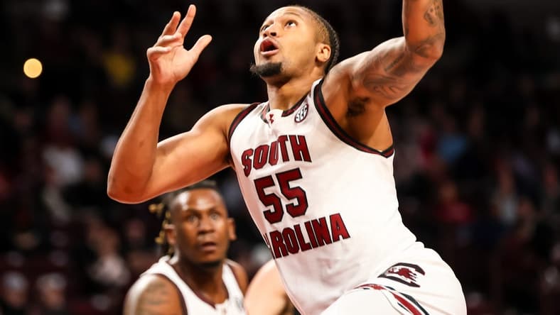 Dec 19, 2023; Columbia, South Carolina, USA; South Carolina Gamecocks guard Ta'Lon Cooper (55) drives against the Winthrop Eagles in the first half at Colonial Life Arena. Mandatory Credit: Jeff Blake-USA TODAY Sports