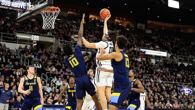 Dec 19, 2023; Providence, Rhode Island, USA; Providence Friars forward Josh Oduro (13) shoots during the first half against the Marquette Golden Eagles at Amica Mutual Pavilion. Mandatory Credit: Eric Canha-USA TODAY Sports