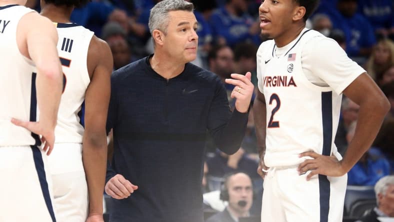 Dec 19, 2023; Memphis, Tennessee, USA; Virginia Cavaliers head coach Tony Bennett reacts during a time out during the first half against the Memphis Tigers at FedExForum. Mandatory Credit: Petre Thomas-USA TODAY Sports