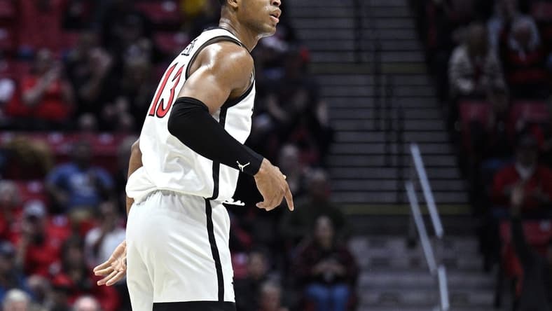 Dec 19, 2023; San Diego, California, USA; San Diego State Aztecs forward Jaedon LeDee (13) reacts after a three-point basket against the Saint Katherine Firebirds during the first half at Viejas Arena. Mandatory Credit: Orlando Ramirez-USA TODAY Sports