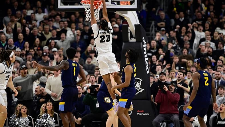 Dec 19, 2023; Providence, Rhode Island, USA; Providence Friars forward Bryce Hopkins (23) dunks the ball against the Marquette Golden Eagles at Amica Mutual Pavilion. Mandatory Credit: Eric Canha-USA TODAY Sports