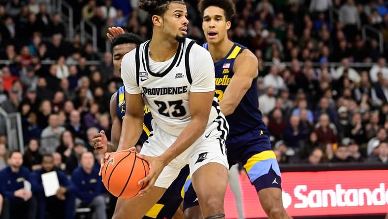 Dec 19, 2023; Providence, Rhode Island, USA; Providence Friars forward Bryce Hopkins (23) looks to pass the ball during the first half against the Marquette Golden Eagles at Amica Mutual Pavilion. Mandatory Credit: Eric Canha-USA TODAY Sports
