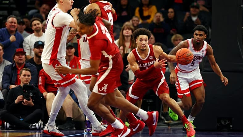 Dec 20, 2023; Phoenix, Arizona, USA; Alabama Crimson Tide guard Mark Sears (1) brings the ball up court during the first half of the game against the Arizona Wildcats in the Hall of Fame Series at Footprint Center. Mandatory Credit: Mark J. Rebilas-USA TODAY Sports