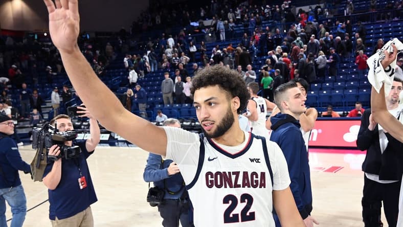 Dec 20, 2023; Spokane, Washington, USA; Gonzaga Bulldogs forward Anton Watson (22) waves to the crowd after a game against the Jackson State Tigers at McCarthey Athletic Center. Gonzaga won 100-76. Mandatory Credit: James Snook-USA TODAY Sports