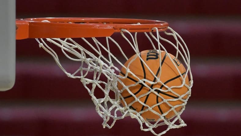 Dec 22, 2023; Los Angeles, California, USA; Detailed view of a basketball going through the net during a game between the Loyola Marymount Lions and the Colorado State Rams at Gersten Pavilion. Mandatory Credit: Jayne Kamin-Oncea-USA TODAY Sports